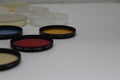 Lot of 6 55mm Lens Filters Canon Toshiba HCE Hoya Green Red Orange Haze
