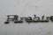 1970-81 Pontiac Firebird Fender Script Emblem Badge #9795240 OEM